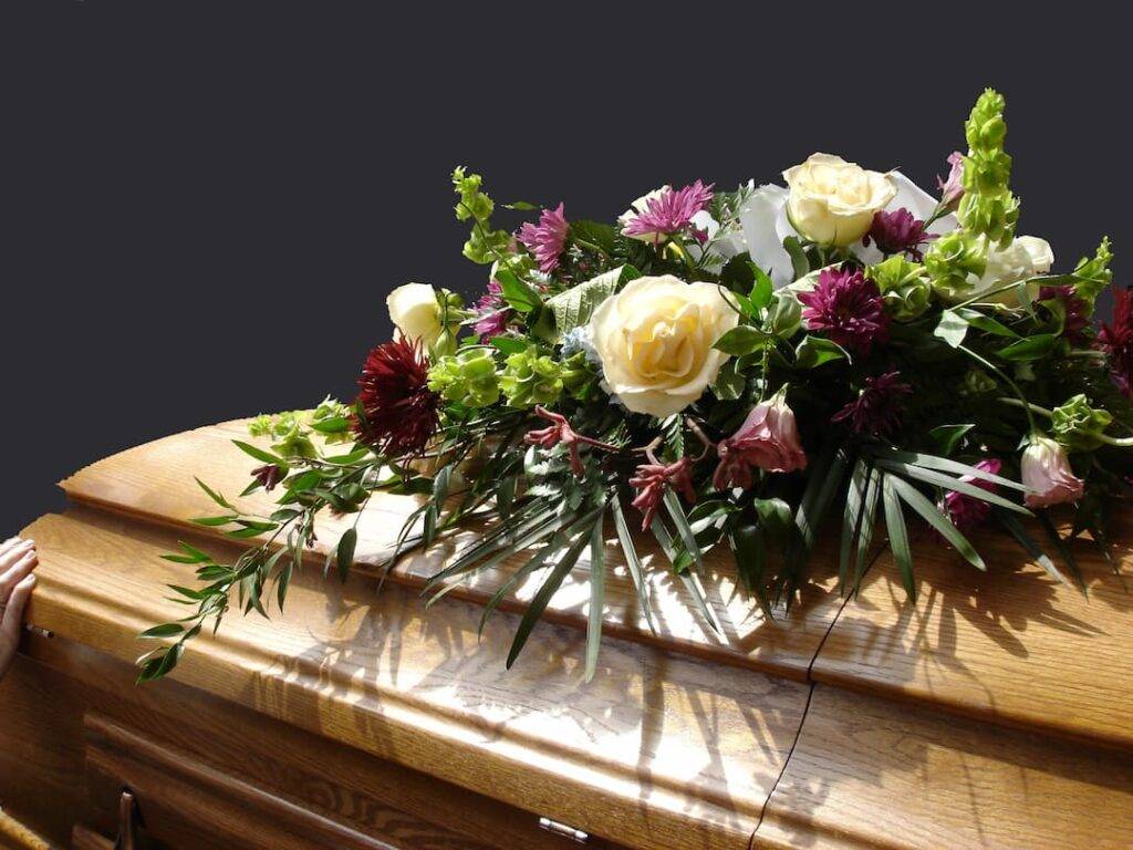 coffin with flowers